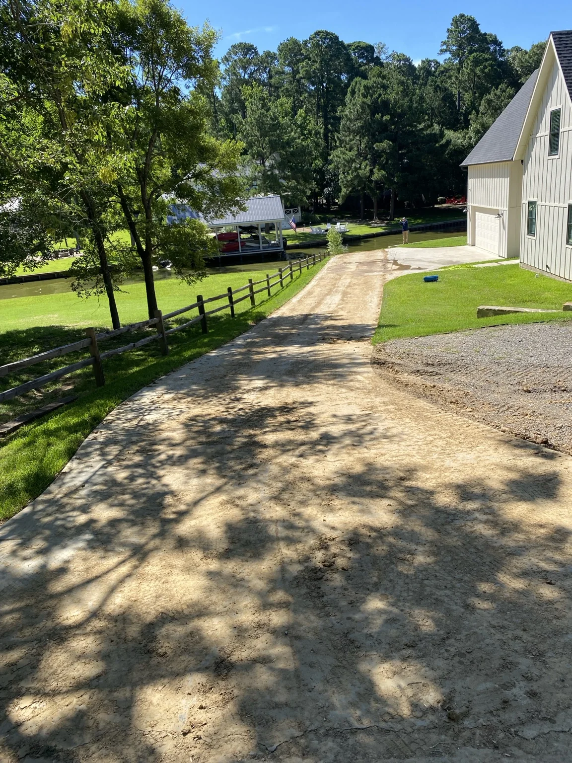 Lake-house driveway before cleaning