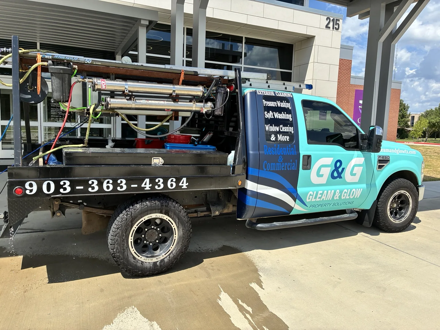 Gleam & Glow professional exterior-cleaning truck and equipment