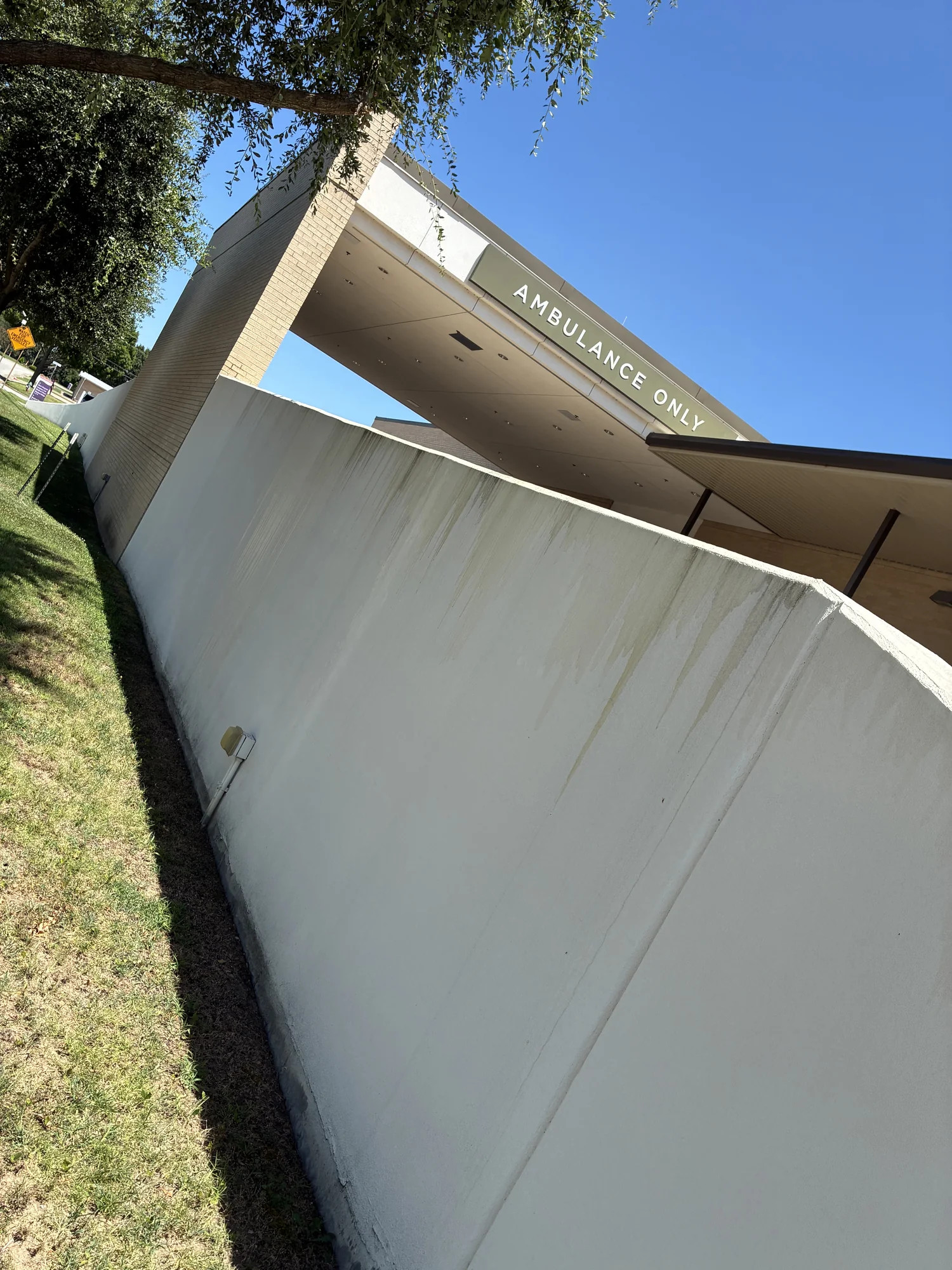 Commercial exterior wall before cleaning